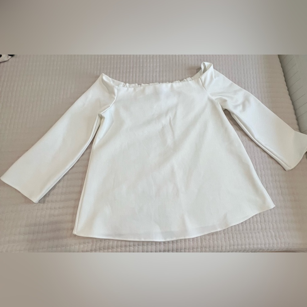 Off shoulder long sleeve white top by Tuckernuck
